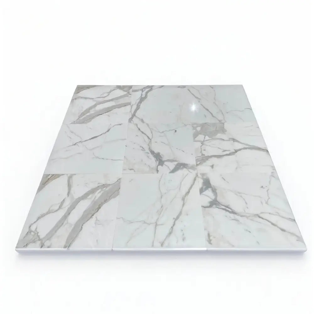 Marble-patterned floor tiles from Calacatta Gold Select Gold Marble 18x18 collection