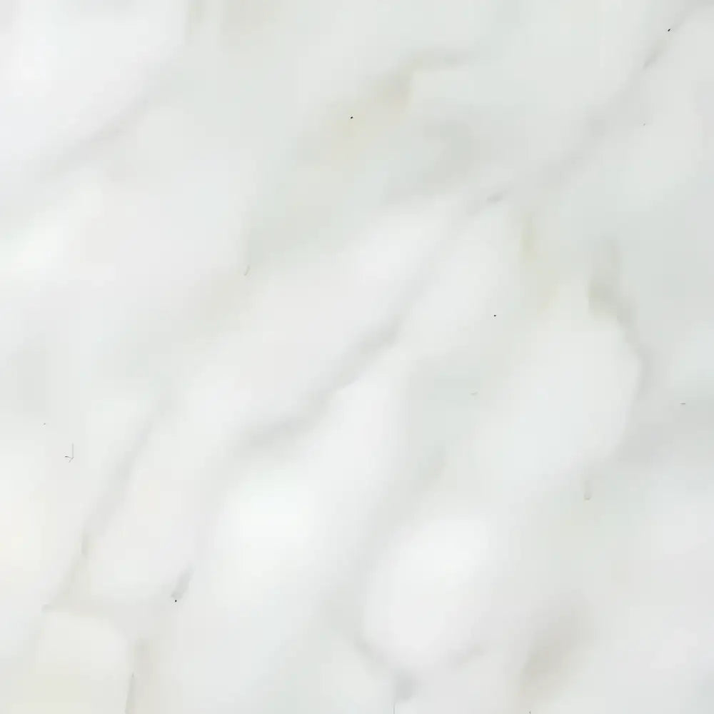 Soft white cotton balls with Calacatta Gold Select Gold Marble 18x18 tiles