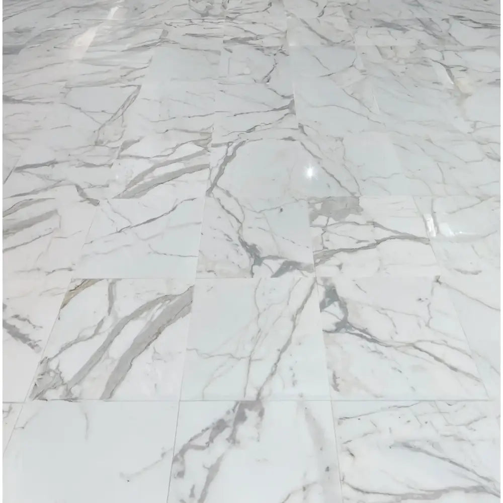 White marble tile floor in Calacatta Gold Select Gold Marble 18X18 polished or honed style