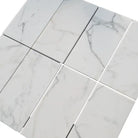 White marble tile arrangement from Calacatta Gold Select Gold Marble 18x18