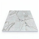 Marble-patterned floor tiles from Calacatta Gold Select Gold Marble 24x24 series
