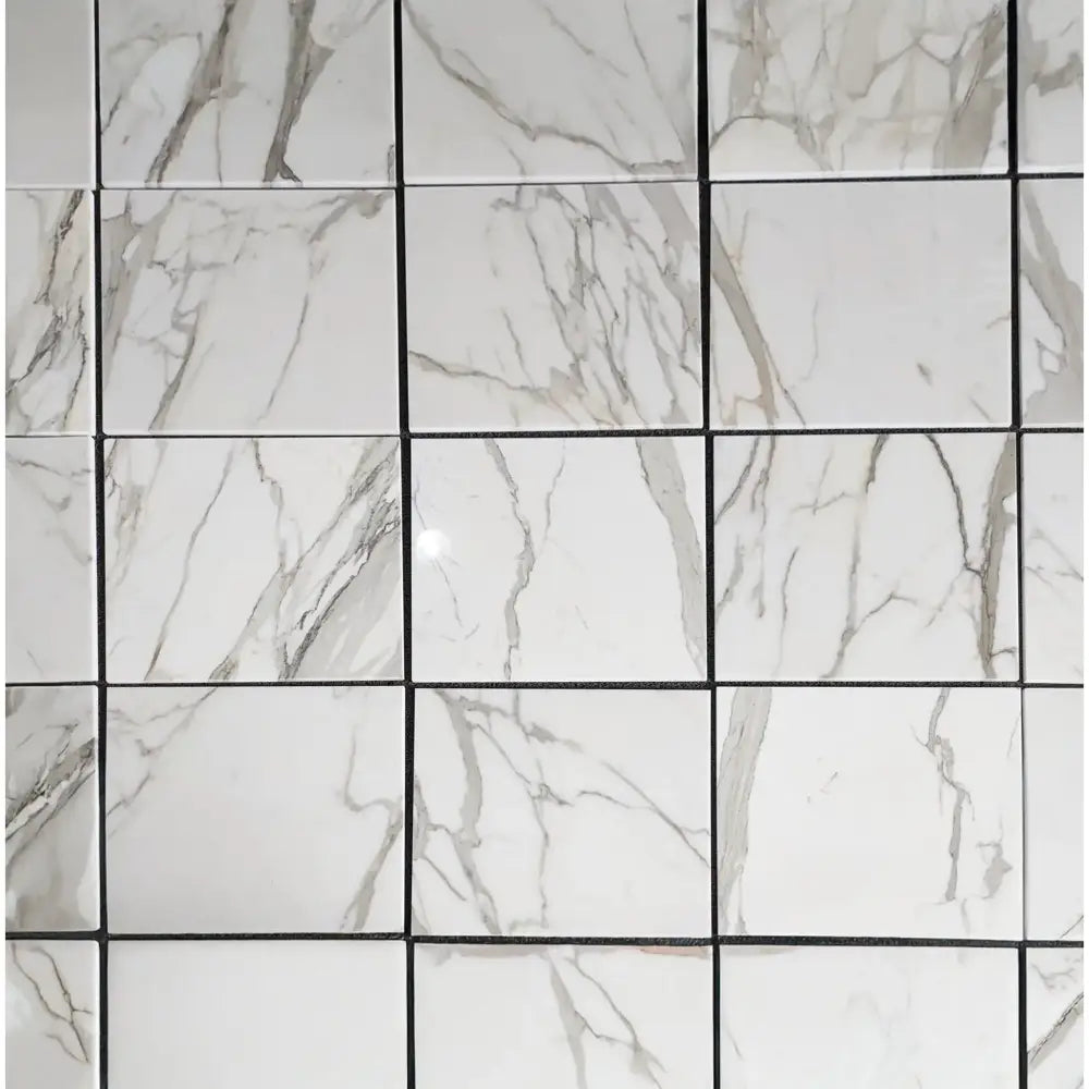 Marble-patterned tile grid from Calacatta Gold Select Gold Marble 24x24 polished or honed