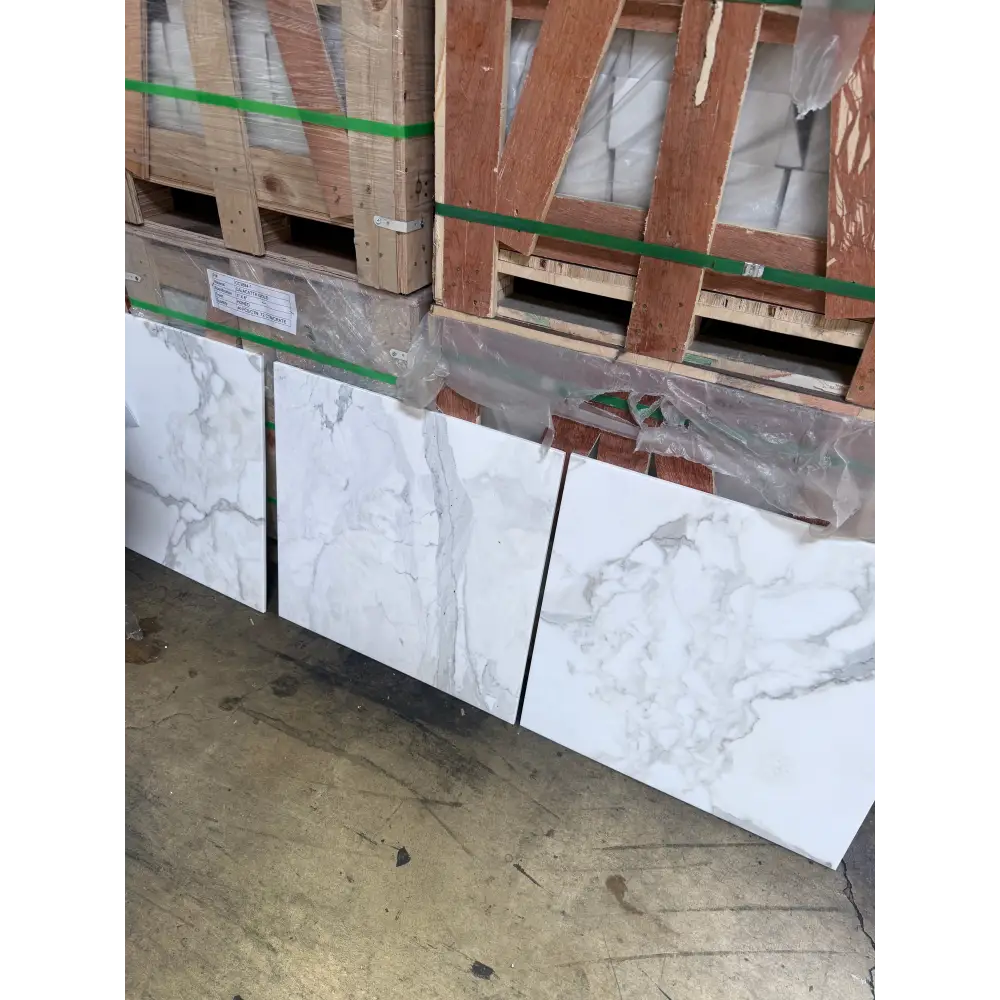 Marble-patterned ceramic tiles in Calacatta Gold Select Gold Marble 24x24 polished or honed