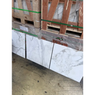 Marble-patterned ceramic tiles in Calacatta Gold Select Gold Marble 24x24 polished or honed