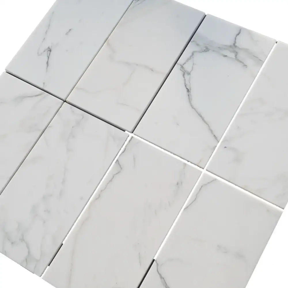 White marble-patterned rectangular tiles from Calacatta Gold Select 24x24 polished or honed