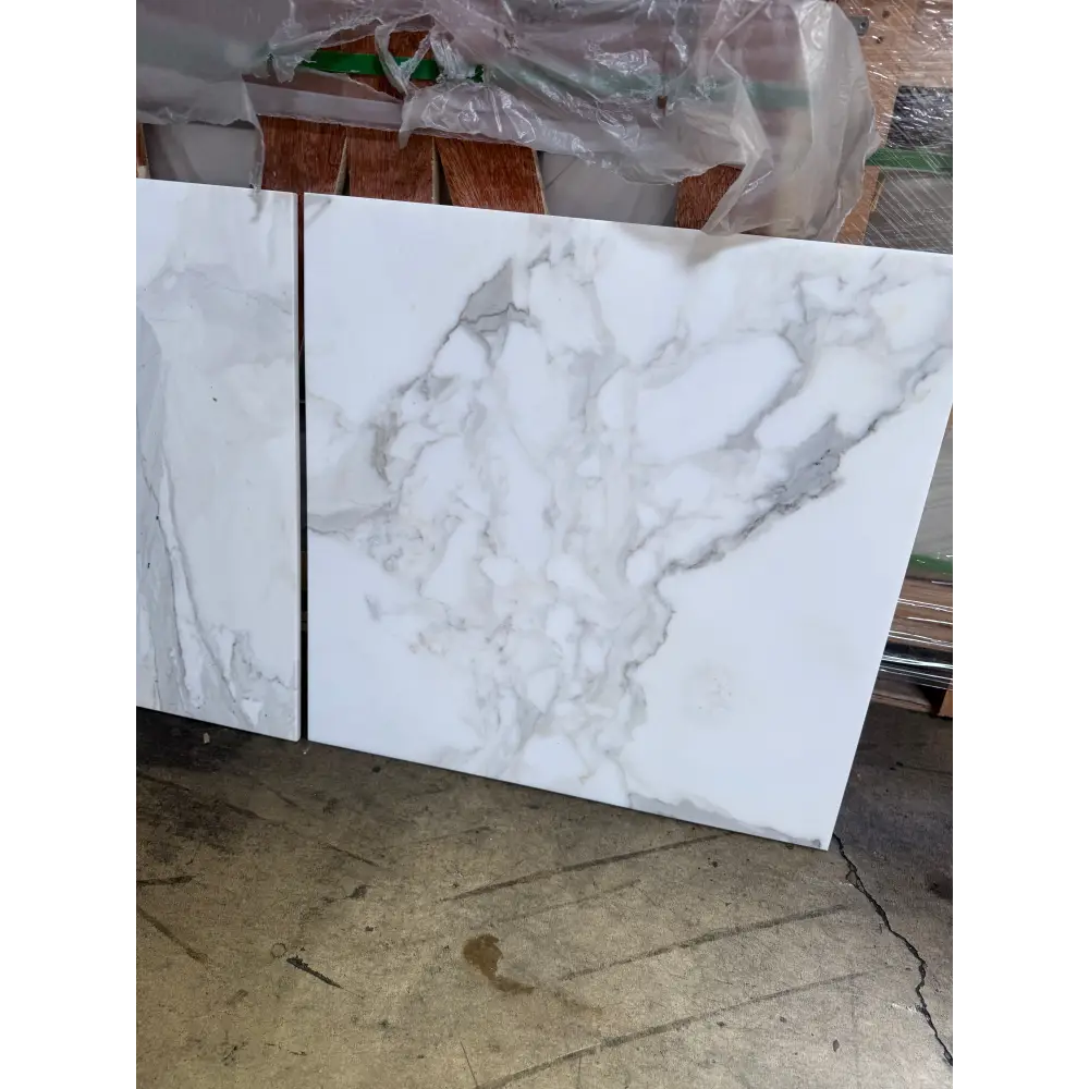 White marble-patterned tiles from Calacatta Gold Select 24x24 polished or honed finish
