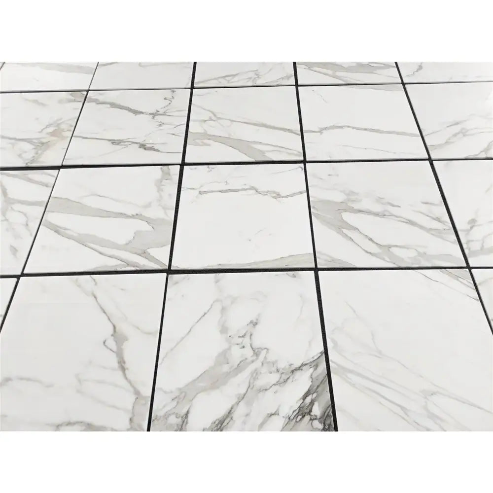 White marble-patterned floor tiles from Calacatta Gold Select 24X24 polished or honed