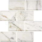 Rectangular Calacatta Gold Select marble tiles with deep-beveled polished-honed finish