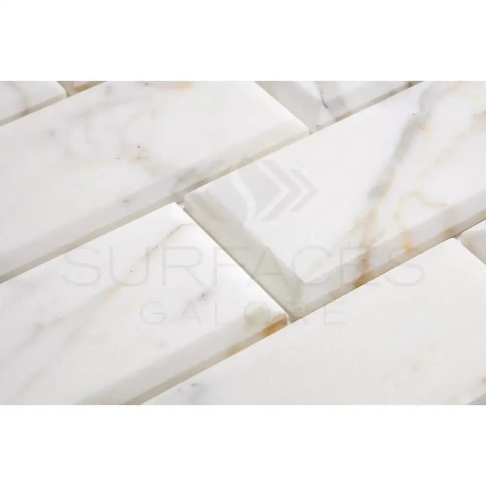 White marble subway tiles from Calacatta Gold Select for elegant backsplashes and walls