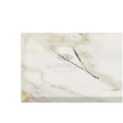 White marble slab with gold and black veining from Calacatta Gold Select marble product