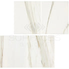 White marble-patterned Calacatta Gold Select Gold Marble 4x12 tiles for elegant design