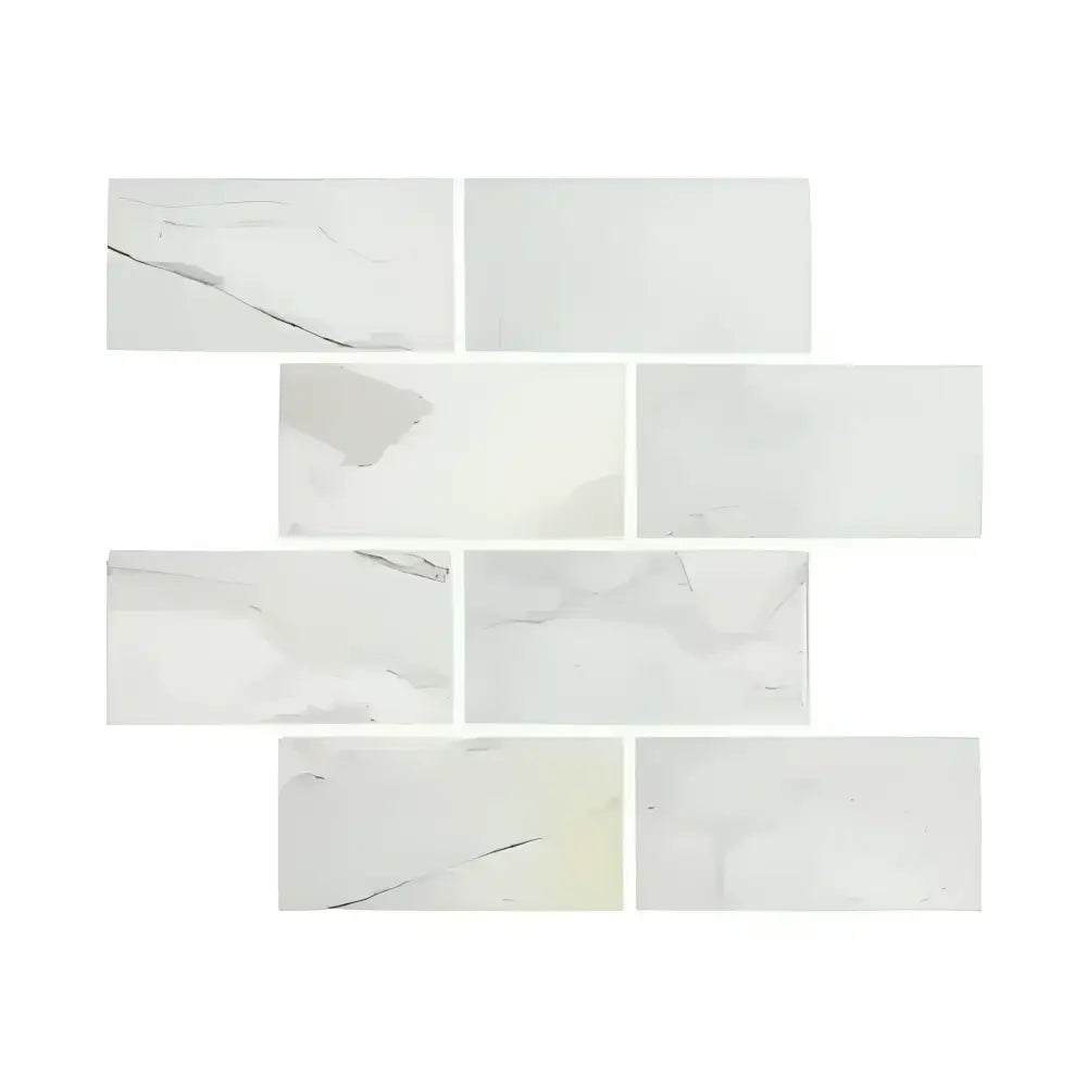 White marble-patterned tiles from Calacatta Gold Select Gold Marble 6X12 collection