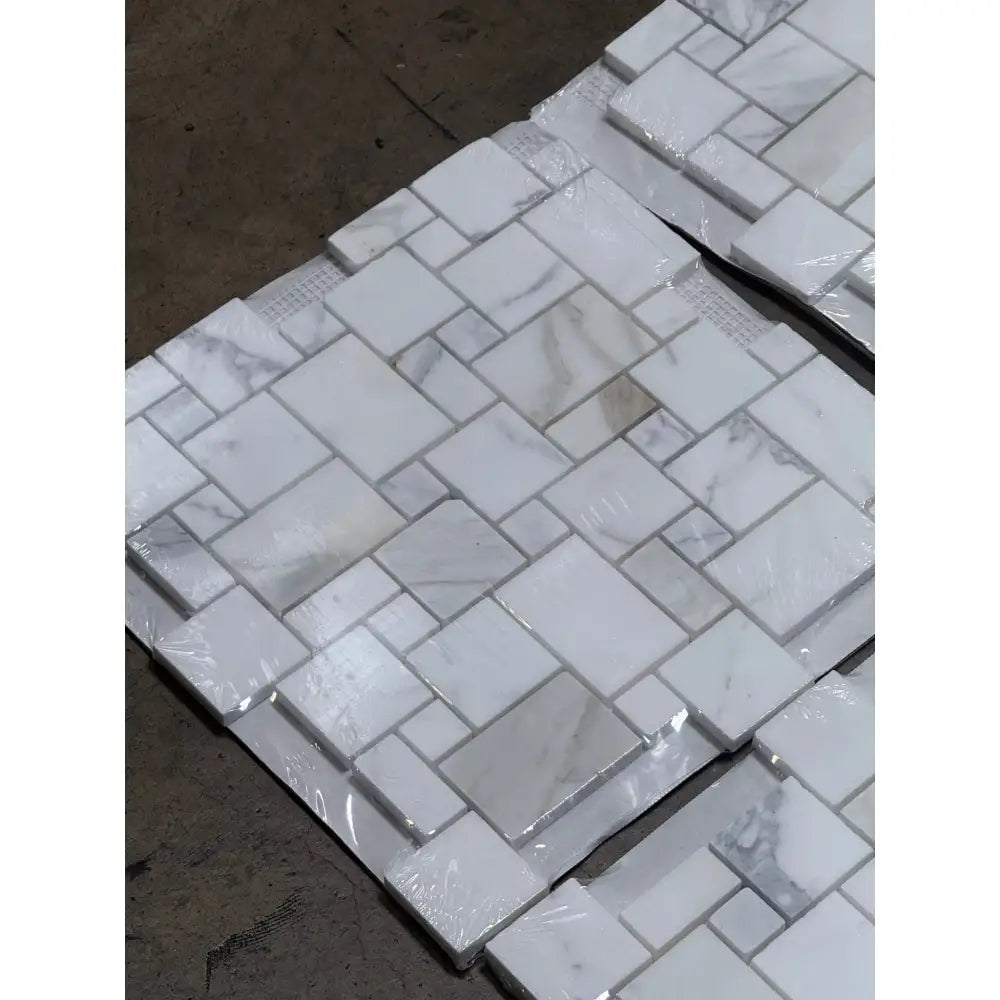 White marble mosaic tile sheets in Calacatta Gold Select Mini-Versailles pattern