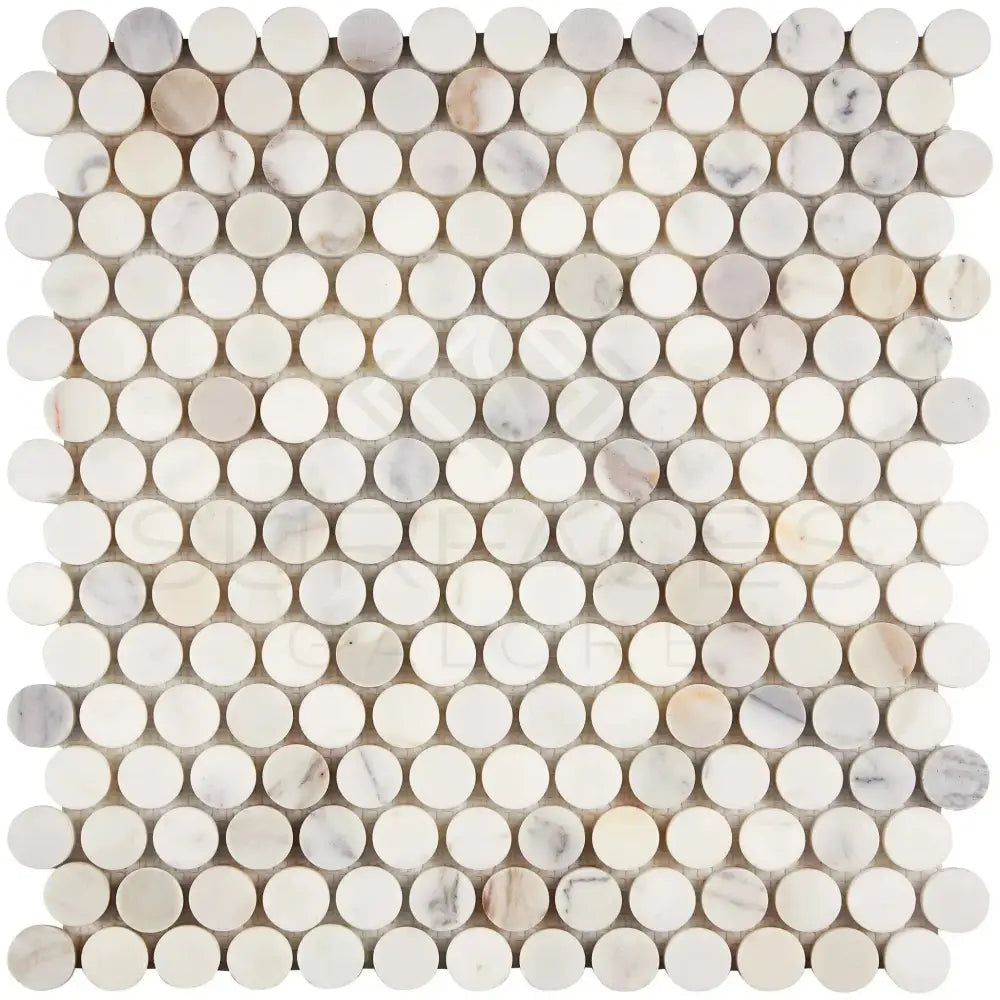 Circular marble mosaic tile sheet featuring Calacatta Gold Select Gold Penny-Round design