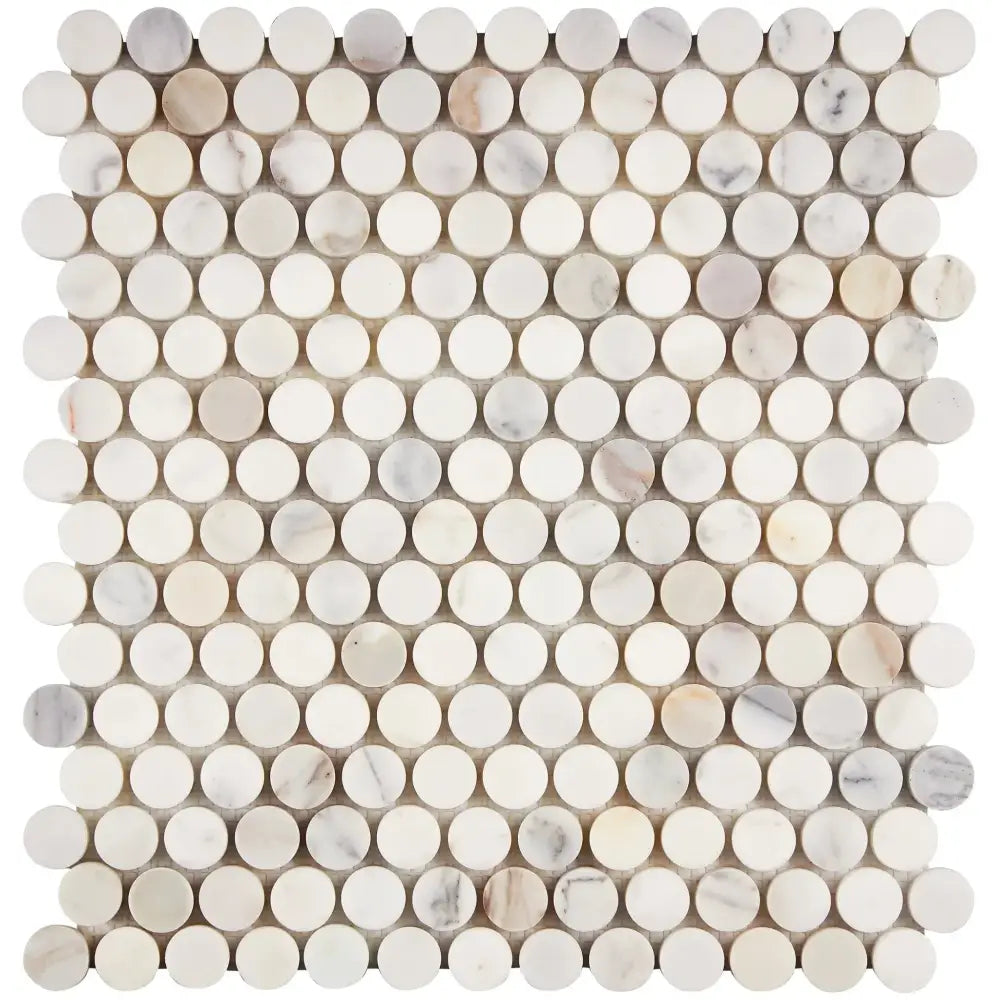 Circular marble mosaic tile sheet featuring Calacatta Gold Select Gold Penny-Round design