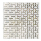White marble mosaic tile from Calacatta Gold Select Gold Pinwheel collection