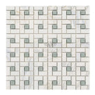 Mosaic tile pattern featuring Calacatta Gold Select Gold Pinwheel Marble Tile