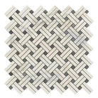 Herringbone patterned mosaic tile from Calacatta Gold Select Gold Stanza collection with blue-gray accents
