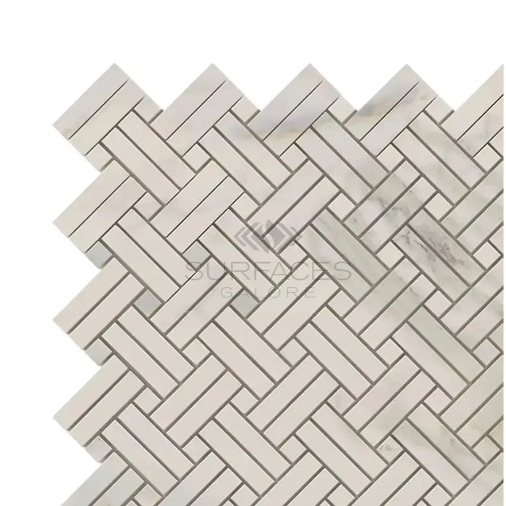 Herringbone pattern of rectangular Calacatta Gold Select Gold Mosaic Marble Tiles