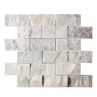 Gray and white stone tile mosaic from Carrara White Royale 2x4 brick marble tile