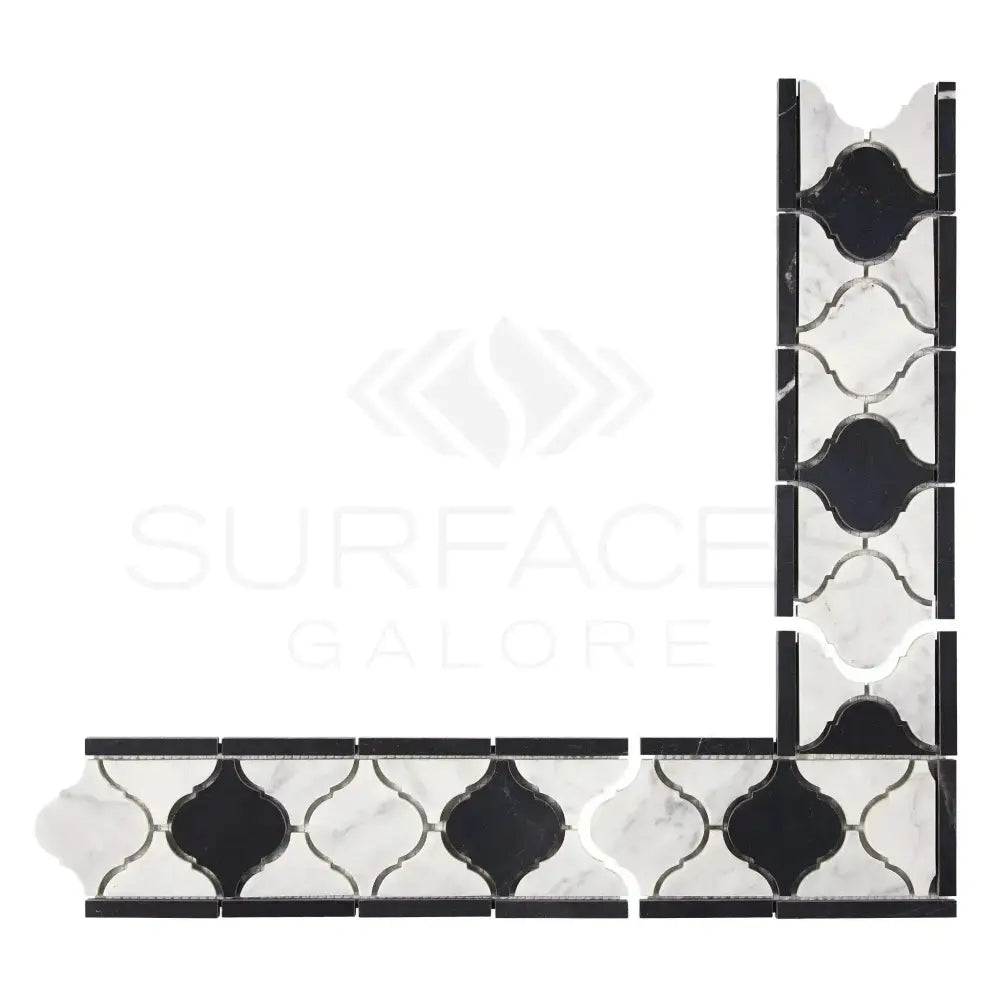 Black and white mosaic tile border from Carrara White Royale luxury collection