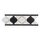 Decorative black and white tile border for Carrara White Royale bathroom design