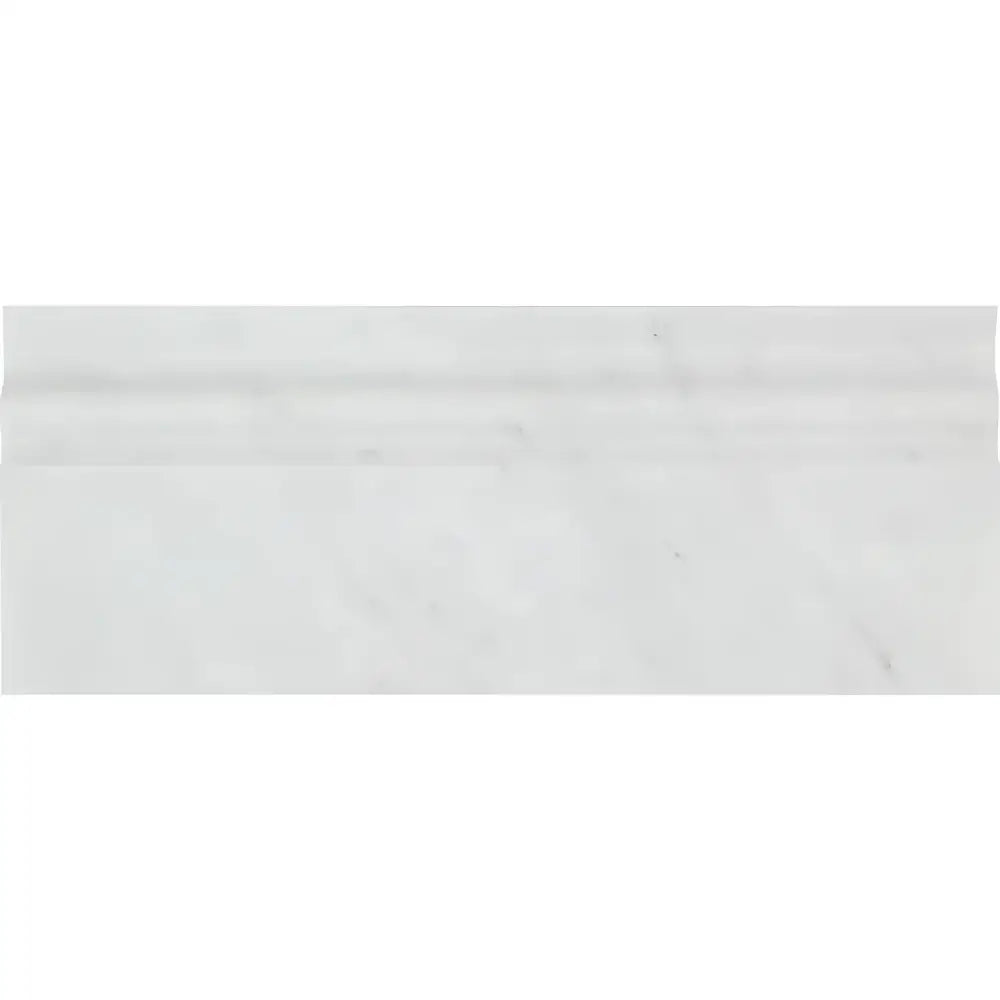 White marble Carrara White Royale baseboard trim with simple profile design