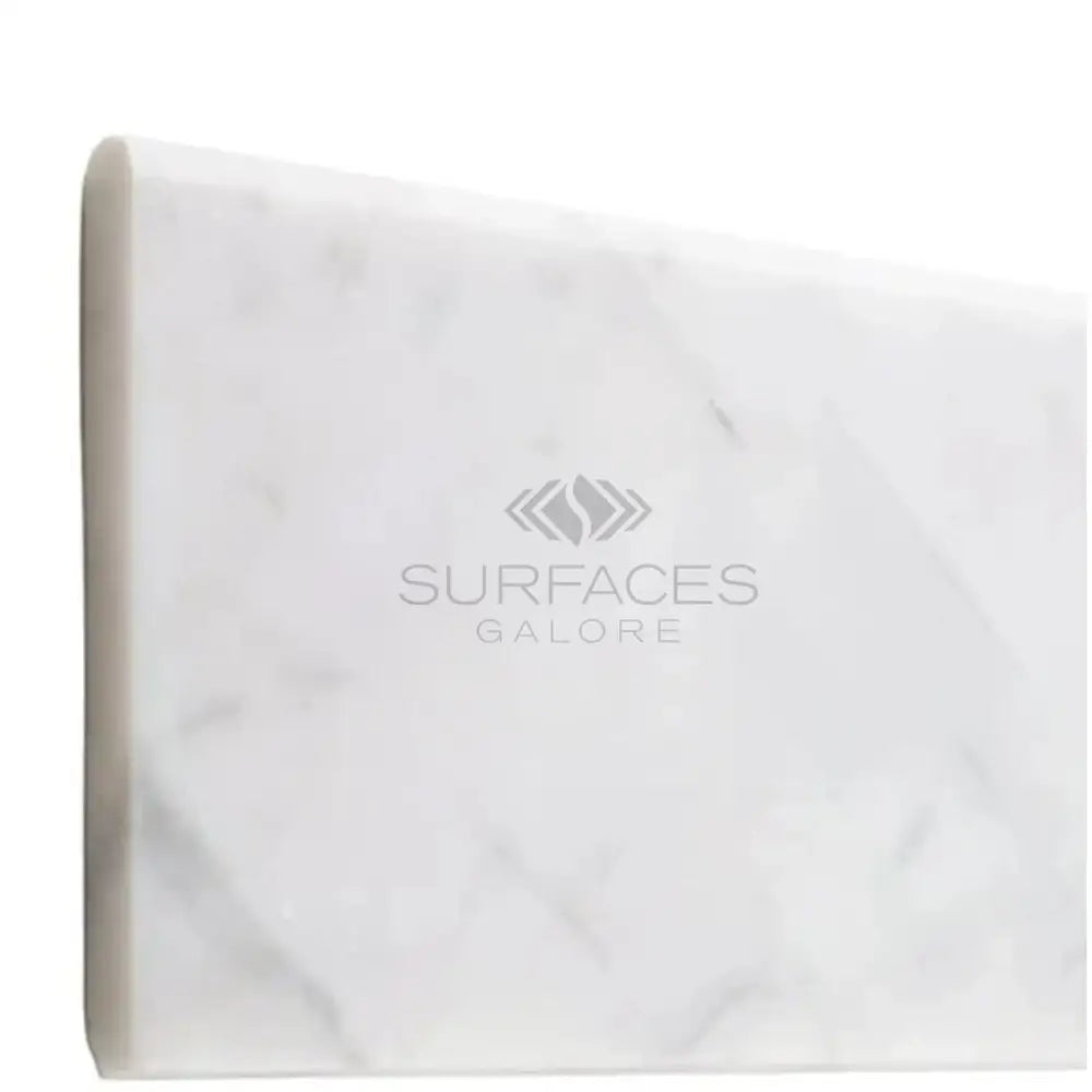 White marble countertop with rounded edge from Carrara White Royale 4X12 tile