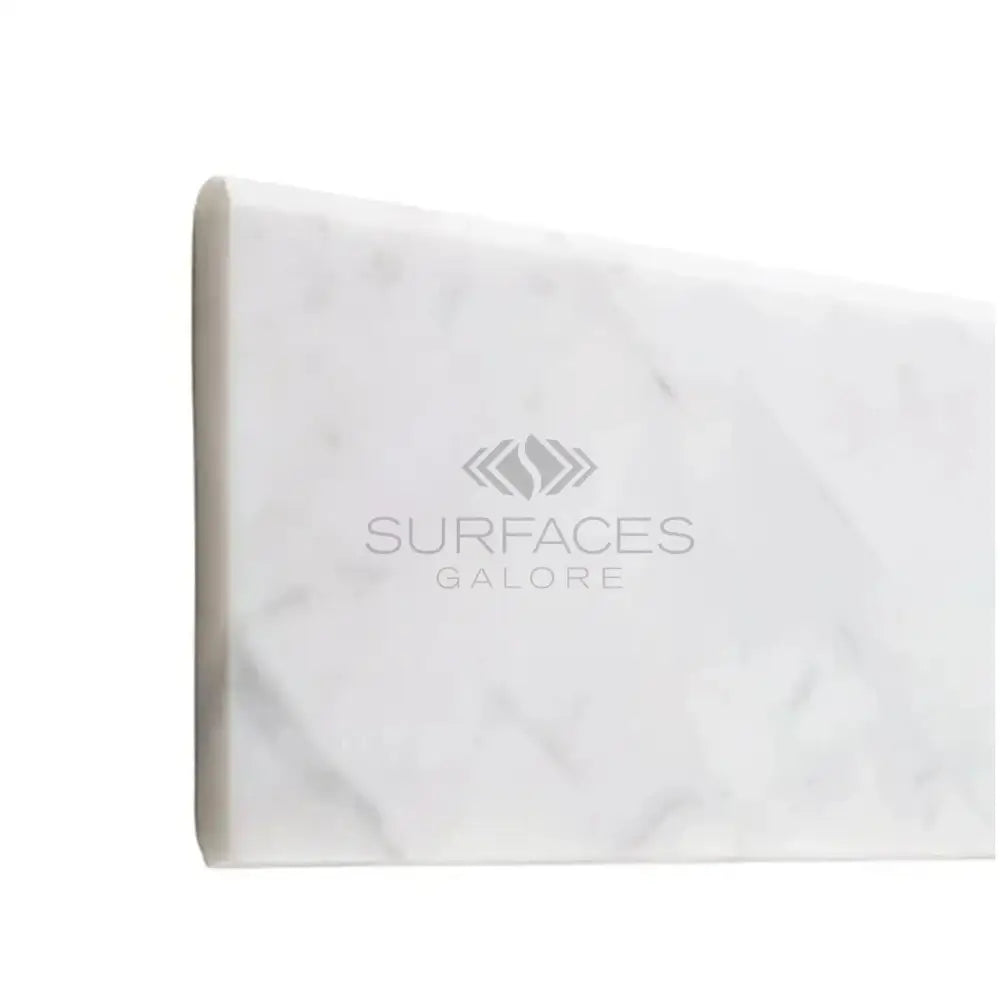 White marble countertop sample from Carrara White Royale 4X12 tile collection