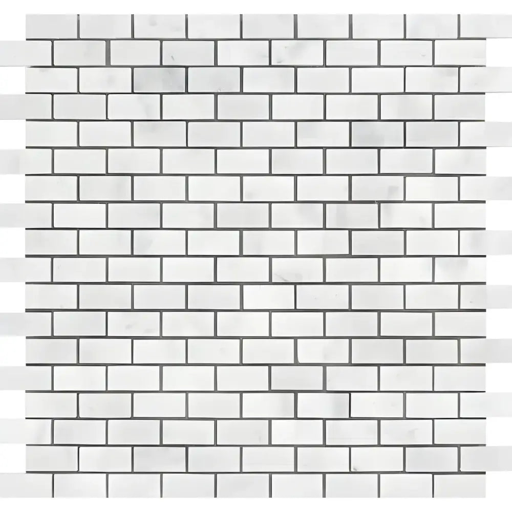 White brick pattern on Carrara White Royale 5/8X1 1/4 Mini-Brick Mosaic Marble Tile