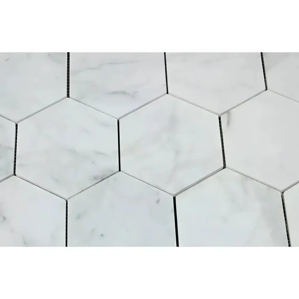 White hexagon marble tiles from Carrara White Royale 5-inch mosaic collection