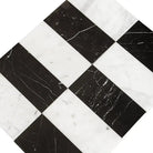 Black and white marble tile pattern from Carrara White Royale and Nero Marquina Prestige set