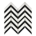 Chevron patterned black and white marble tile from Carrara White Royale Mosaic collection