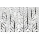 White chevron mosaic tile from Carrara White Royale Marble Mosaic collection