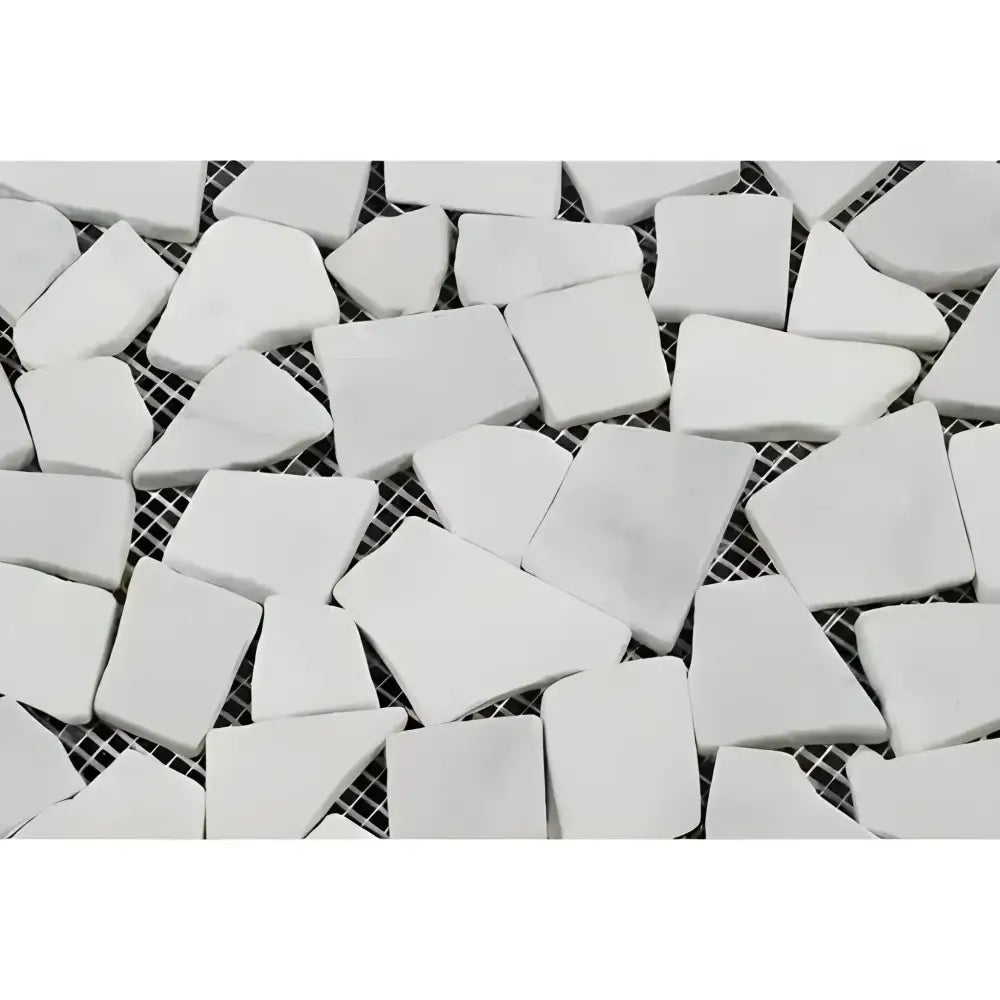 White mosaic tile sheet featuring Carrara White Royale Tumbled Marble for elegant surfaces