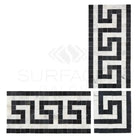 Black and white mosaic tile border from Carrara White Royale Greek Key Corner collection