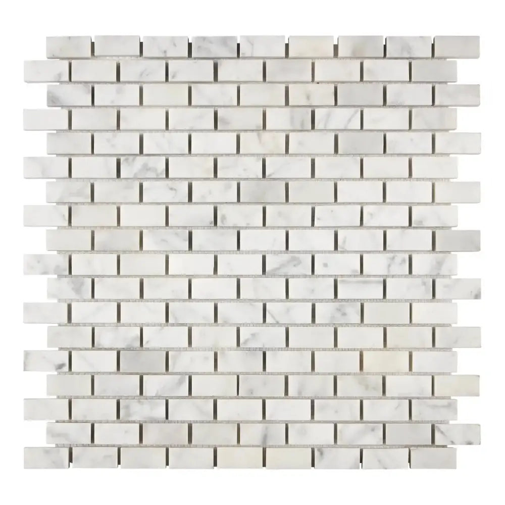 Carrara White Royale marble brick mosaic tile in herringbone pattern for elegant interiors