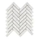 White marble herringbone tile from Carrara White Royale Mosaic collection