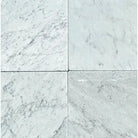 Carrara White Royale marble 12x12 tumbled tiles showcased in elegant white marble style