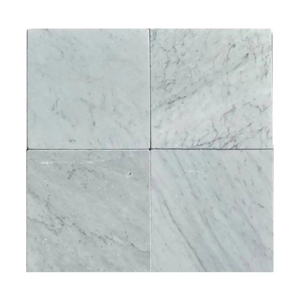 Four Carrara White Royale Marble 12x12 tumbled tiles for flooring or backsplash applications