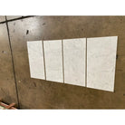 Four white Carrara marble tiles in 12x24 polished or honed finish