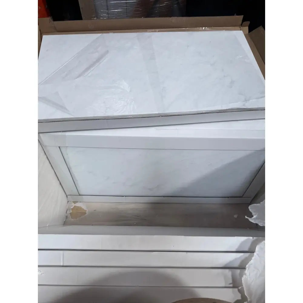 Stacked white panels from Carrara White Royale Marble 18x36 polished or honed
