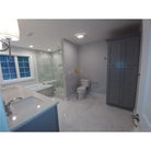 Bathroom with Gray Cabinets featuring Carrara White Royale Marble 3x6 Tumbled tiles
