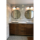 Bathroom vanity with dual sinks featuring Carrara White Royale Marble 3x6 Tumbled tiles