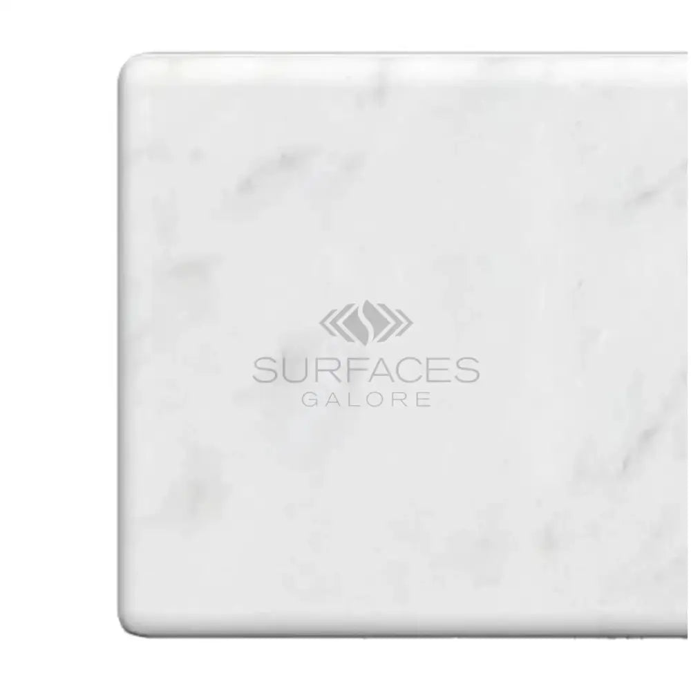 White marble countertop sample from Carrara White Royale Marble 3x6 Tumbled collection