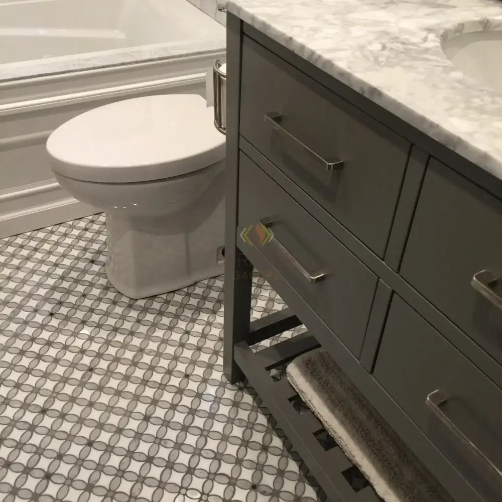 Gray bathroom vanity with Carrara White Royale Marble 3x6 tumbled top