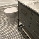 Gray bathroom vanity with Carrara White Royale Marble 3x6 tumbled top