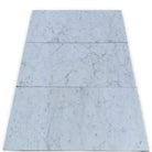 Carrara White Royale Marble 3X6 Tumbled marble-patterned floor tiles