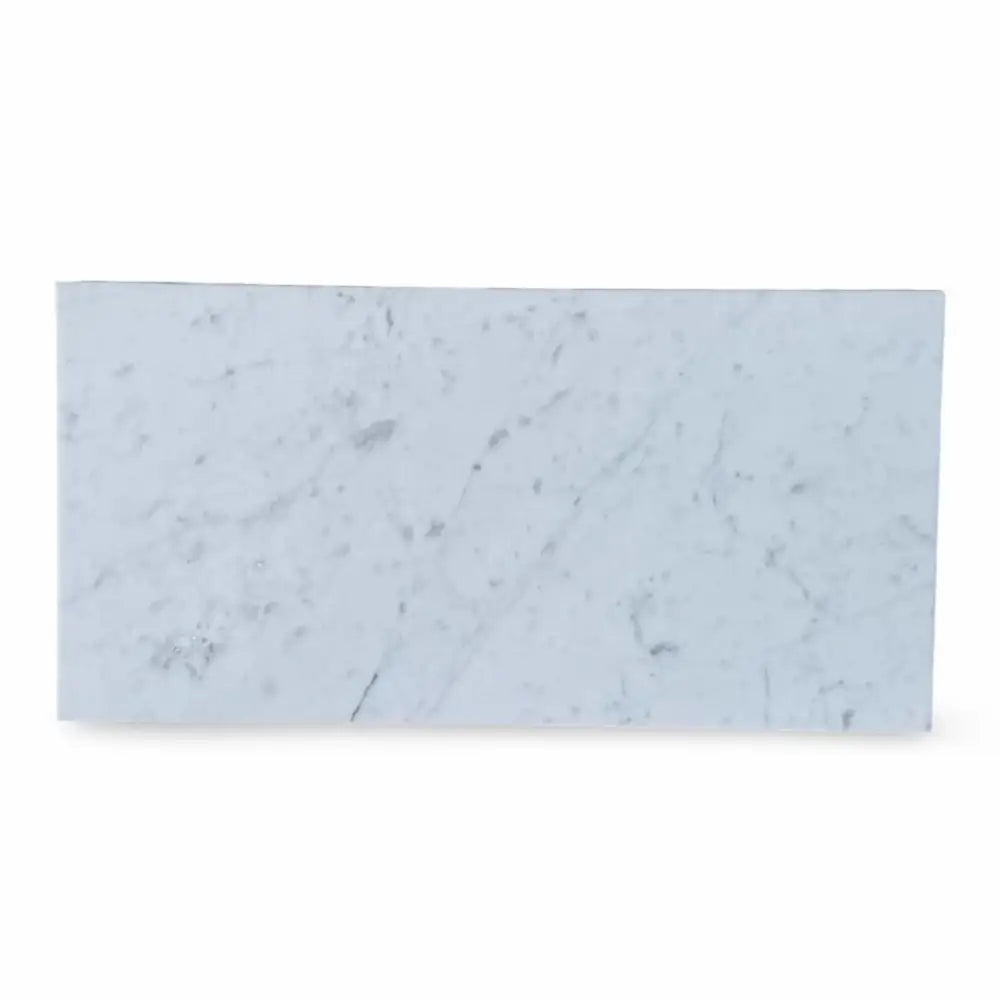Rectangular Carrara White Royale marble slab with a tumbled finish for elegant surfaces