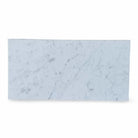 Rectangular Carrara White Royale marble slab with a tumbled finish for elegant surfaces